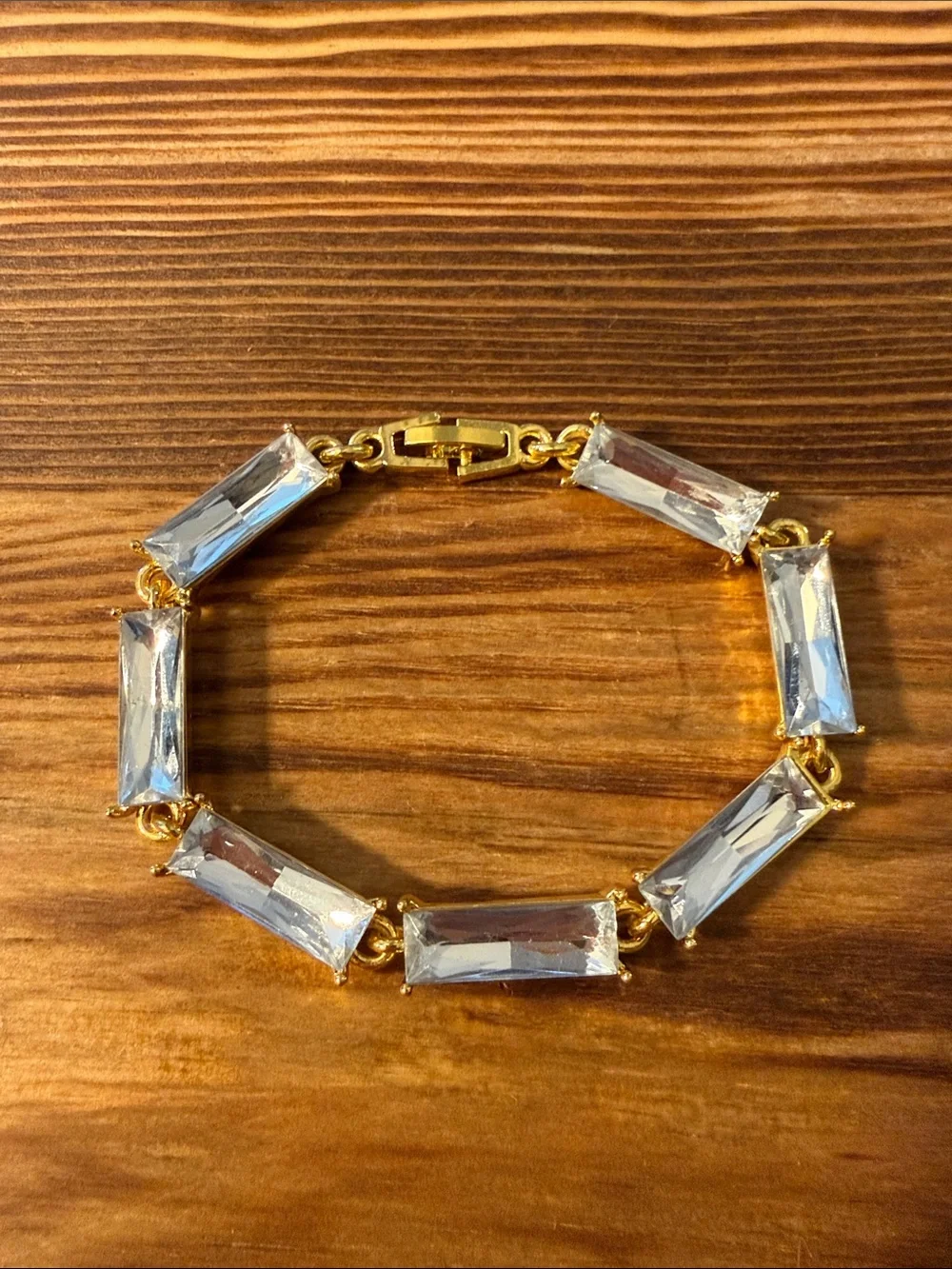 Gold tone with clear Tennis bracelet wiith baguette-cut stones